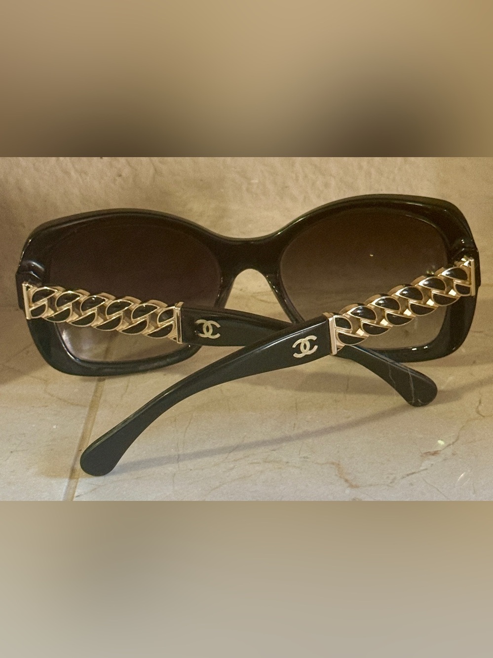CHANEL Black Sunglasses with Gold Chain Temple Accents